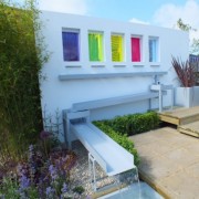 Water trickles down the coloured panels into the rill leading into a small pool (03/05/2012) Added by Mary Ann Le May Garden Designs