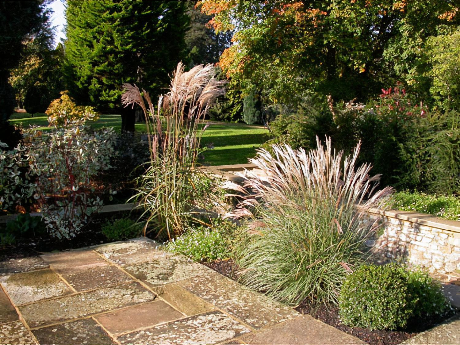 Water garden with reflective pool & rill by Hampshire garden designer Janet Bligh