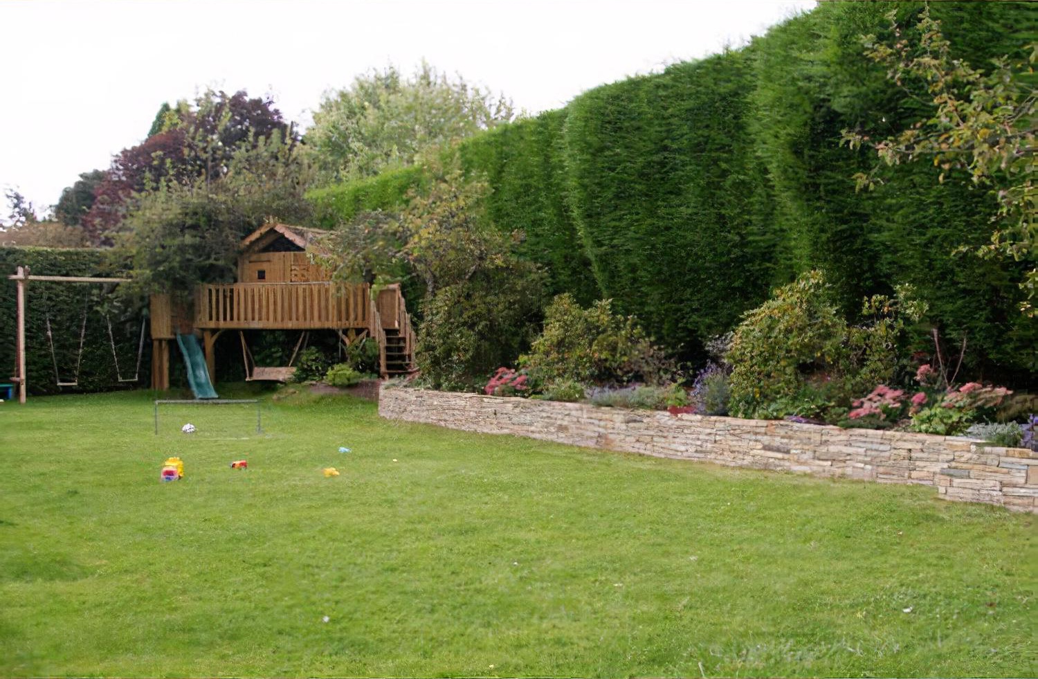 Large family garden in Surrey by Hampshire garden designer Janet Bligh